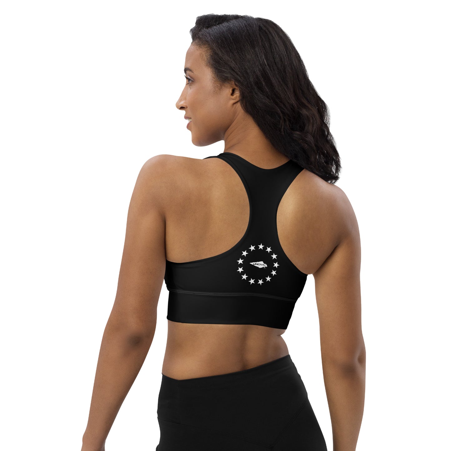 Black longline high support Betsy Ross UNCIVIL Sports bra. With its compression fabric and double-layered front and shoulder straps, you can rest assured that you'll be supported through any activity.