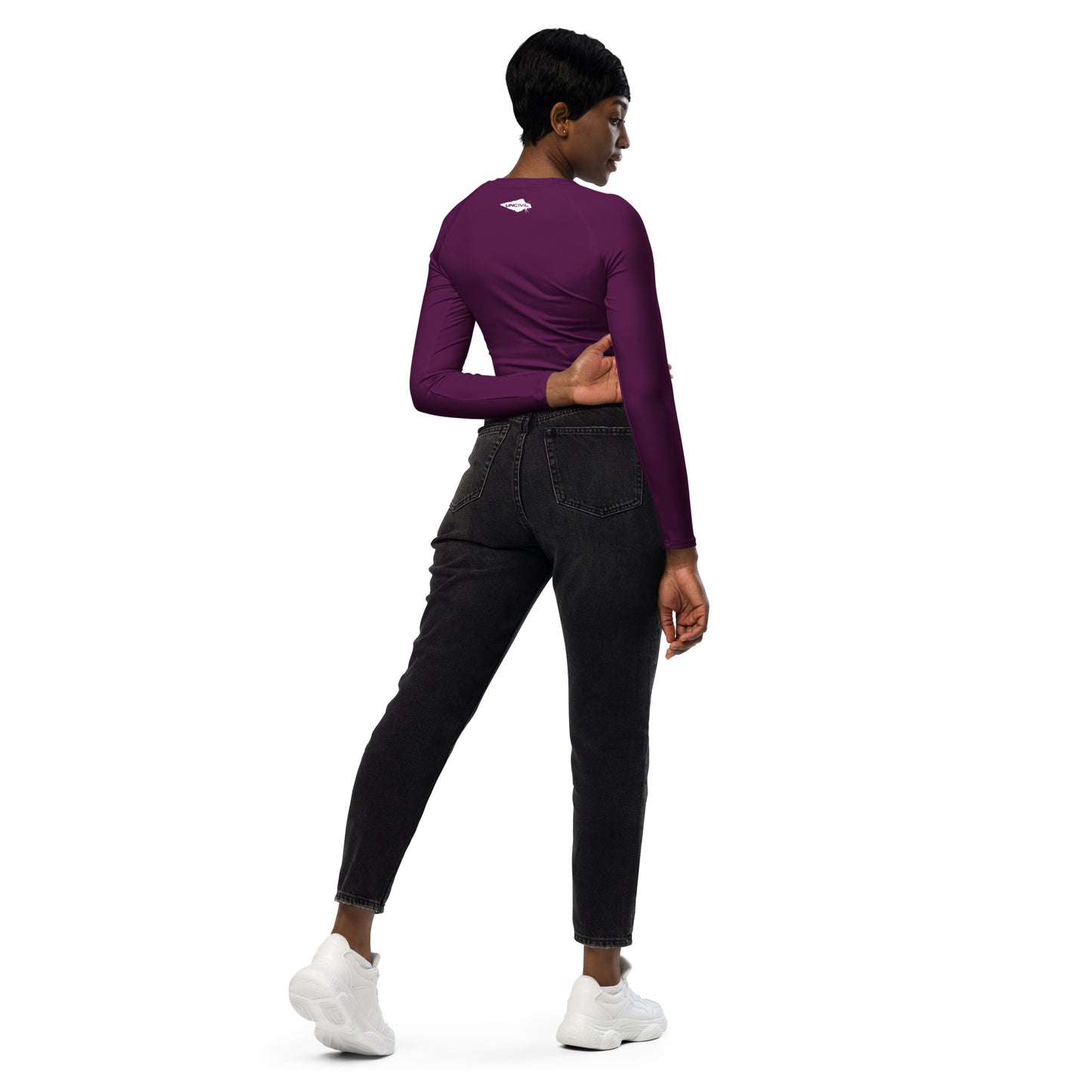 Dark Fuchsia long-sleeve crop top for women is made of recycled polyester and elastane, making it an eco-friendly choice for swimming, sports, or athleisure. UPF 50+.