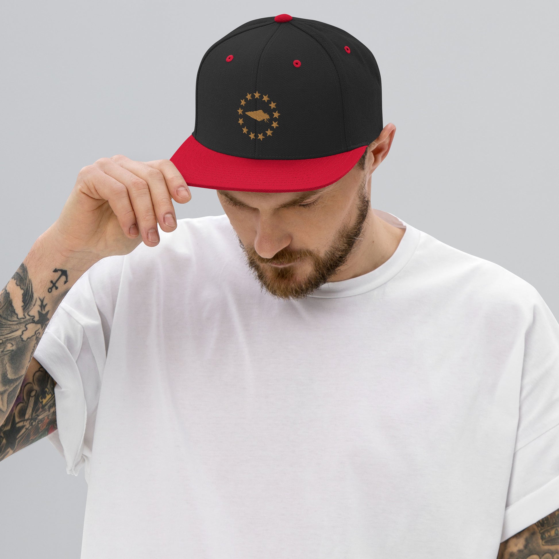 Embrace your patriotic side with our Black and Red Betsy Ross UNCIVIL Snapback hat. Featuring the iconic 13 stars design, this hat is perfect for anyone who loves America and its rich history.