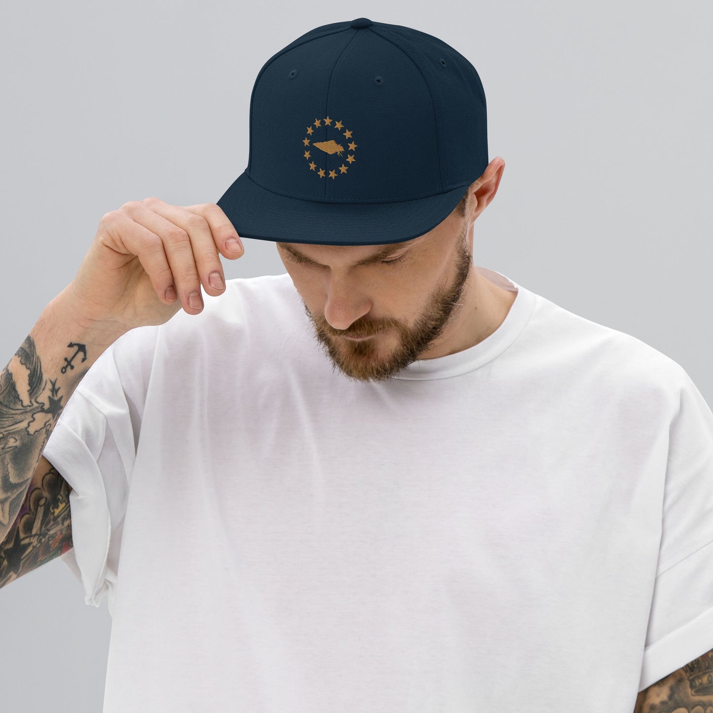 Embrace your patriotic side with our Navy and Gold Betsy Ross UNCIVIL Snapback hat. Featuring the iconic 13 stars design, this hat is perfect for anyone who loves America and its rich history.