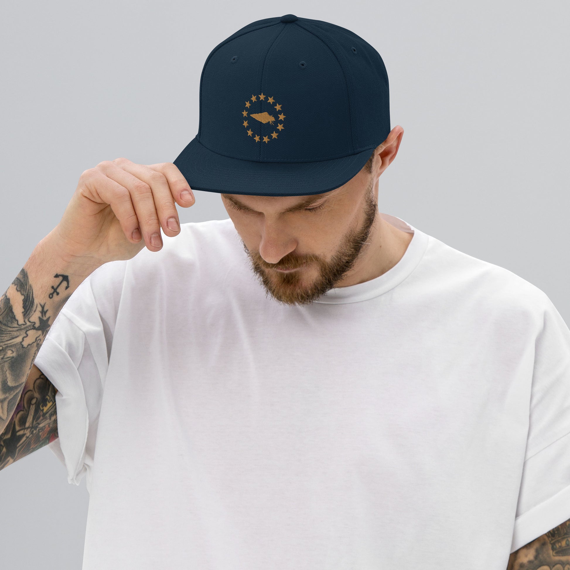 Embrace your patriotic side with our Navy and Gold Betsy Ross UNCIVIL Snapback hat. Featuring the iconic 13 stars design, this hat is perfect for anyone who loves America and its rich history.