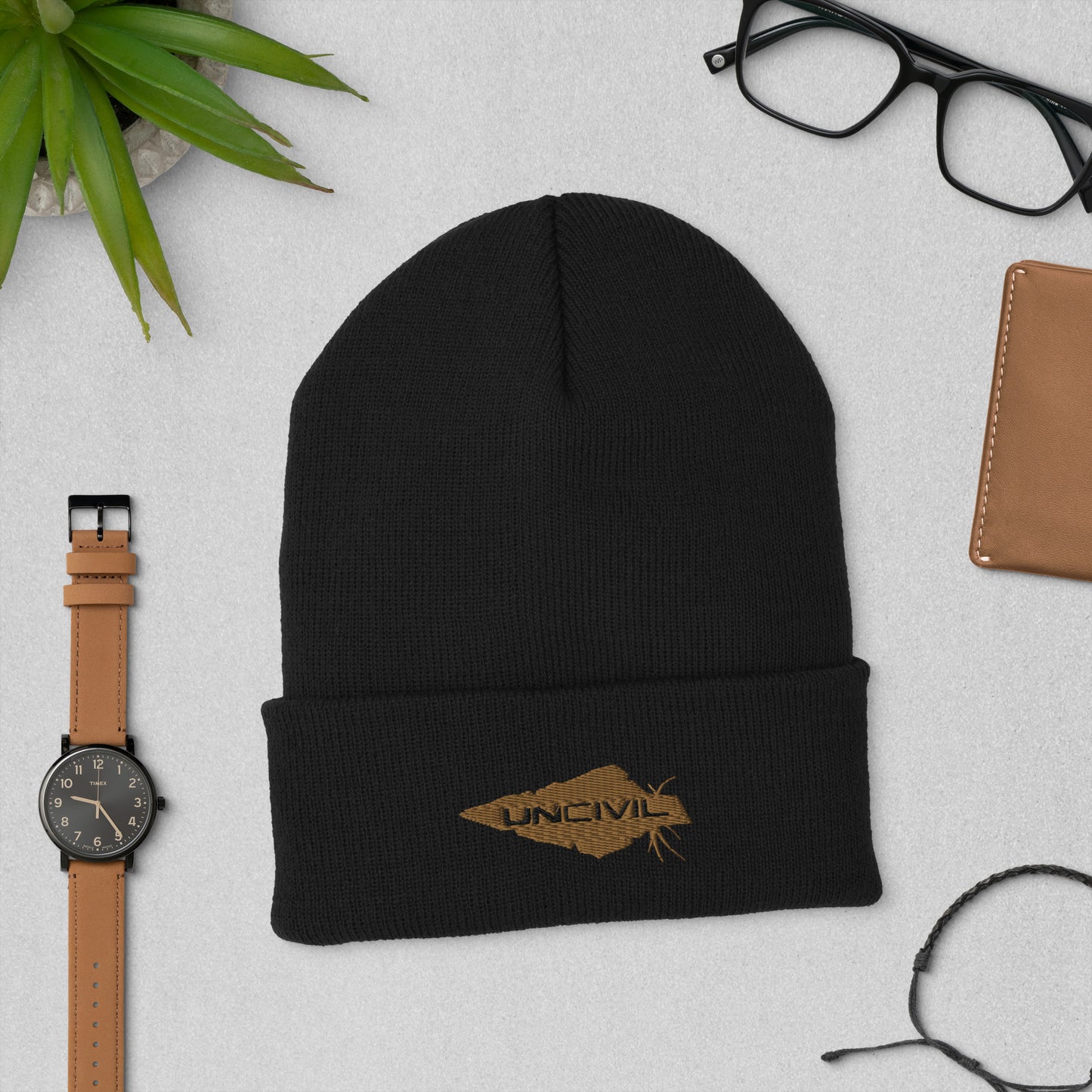 Our UNCIVIL Gold cuffed beanie is a snug, form-fitting beanie for men or women. Offered in Black with our Gold UNCIVIL Spear.
