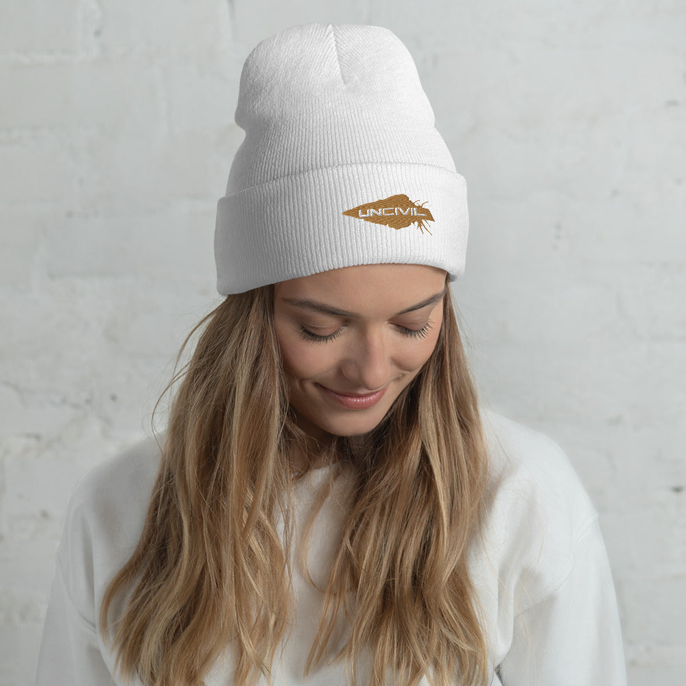 Our UNCIVIL Gold cuffed beanie is a snug, form-fitting beanie for men or women. Offered in White with our Gold UNCIVIL Spear.