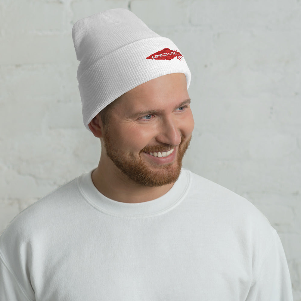 Our UNCIVIL Gold cuffed beanie is a snug, form-fitting beanie for men or women. Offered in White with our Red UNCIVIL Spear.