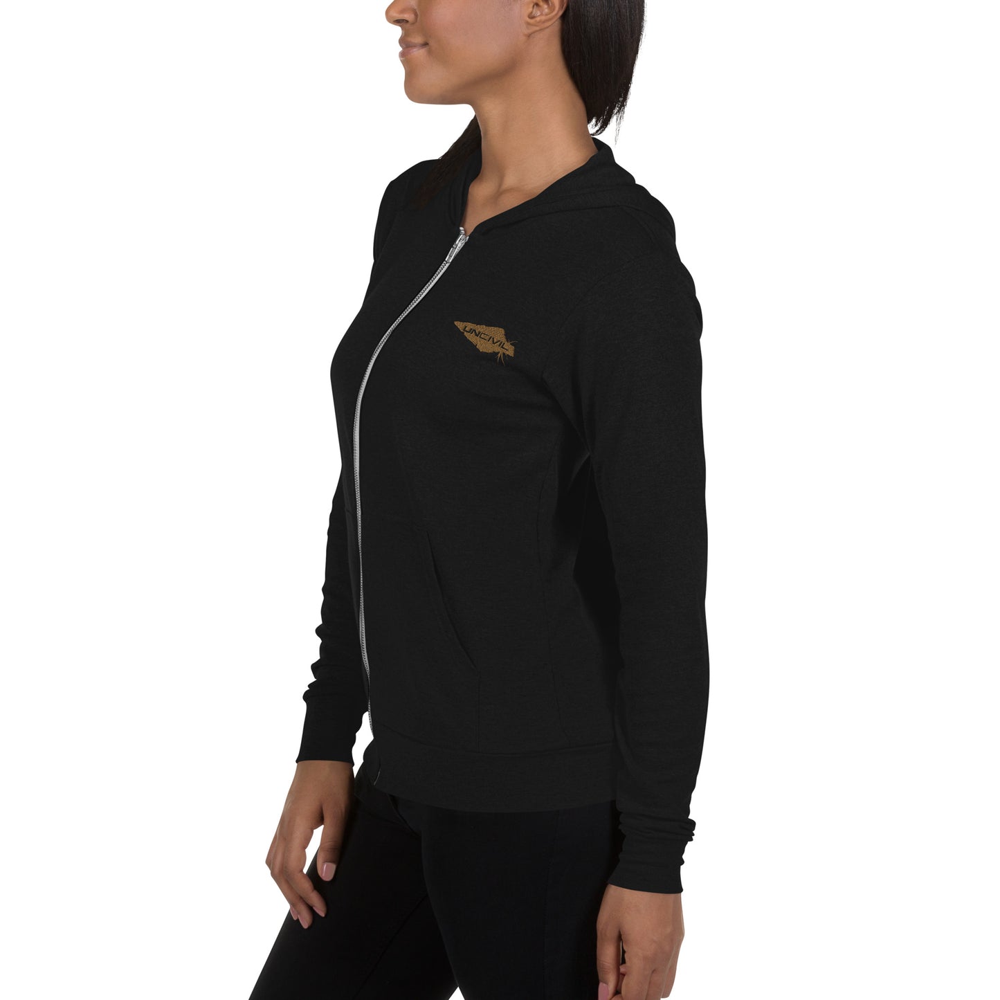 Black UNCIVIL Lightweight Hoodie features our gold uncivil spear. It is lightweight unisex zip hoodie has a modern fit, hood, front zip, and a kangaroo pocket is the way to go.