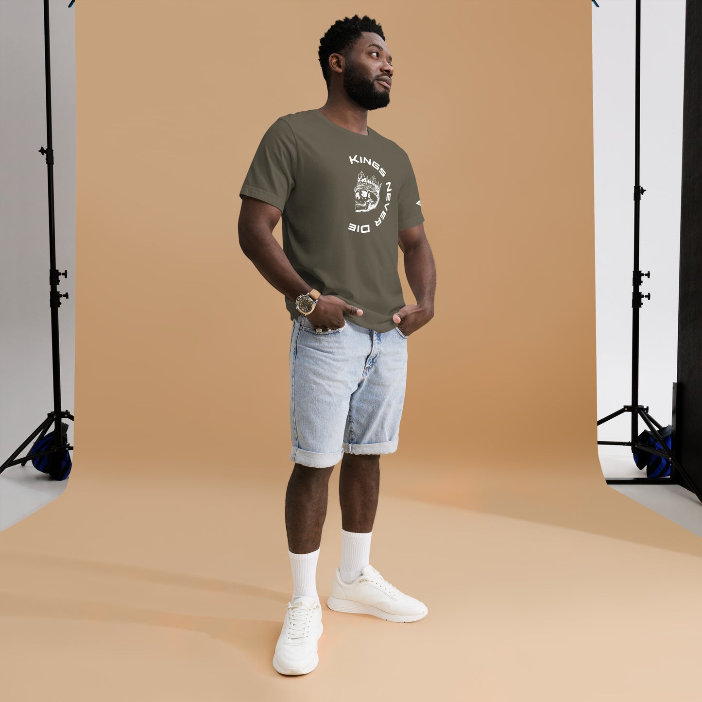 Kings Never Die shirt. The skull graphic wearing a king's crown, Army Green Men's shirt.