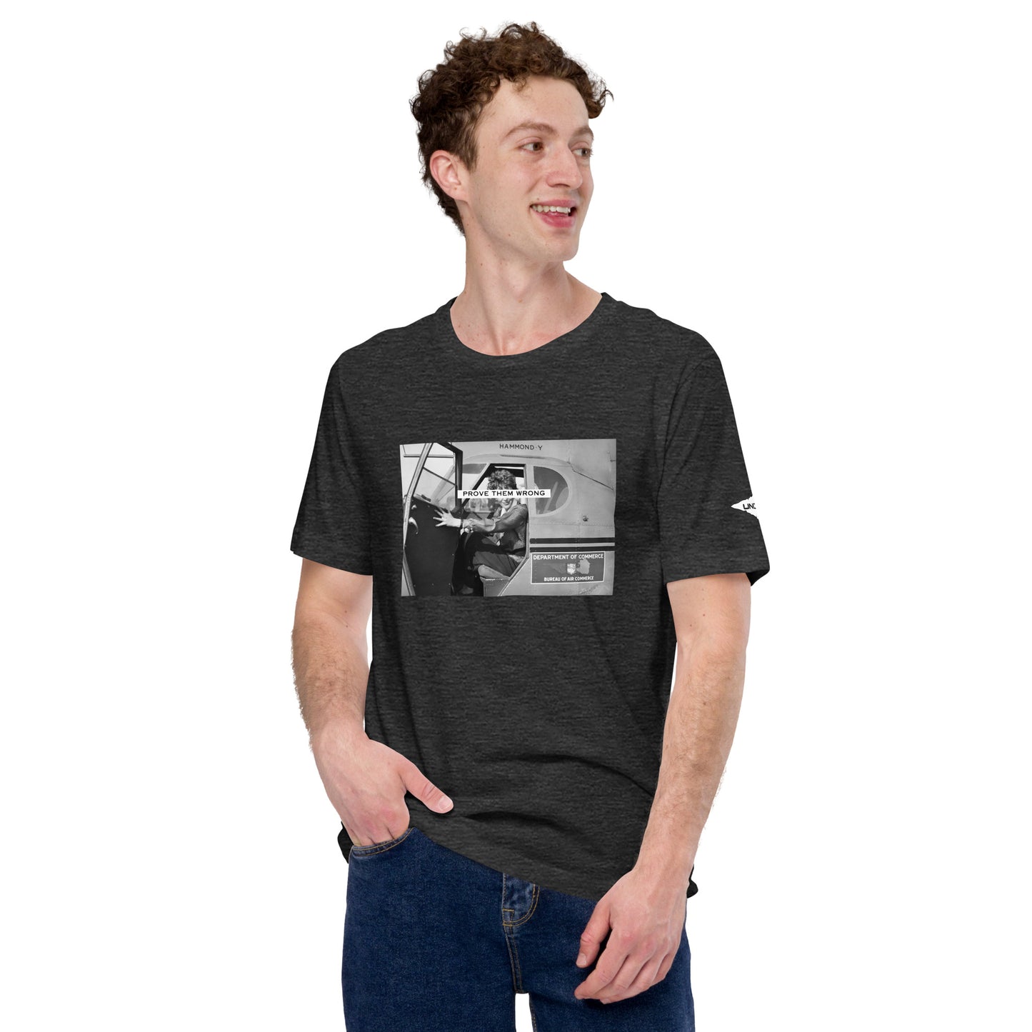 Prove Them Wrong graphic t-shirt features a graphic of Amelia Earhart on a plane in black and white.