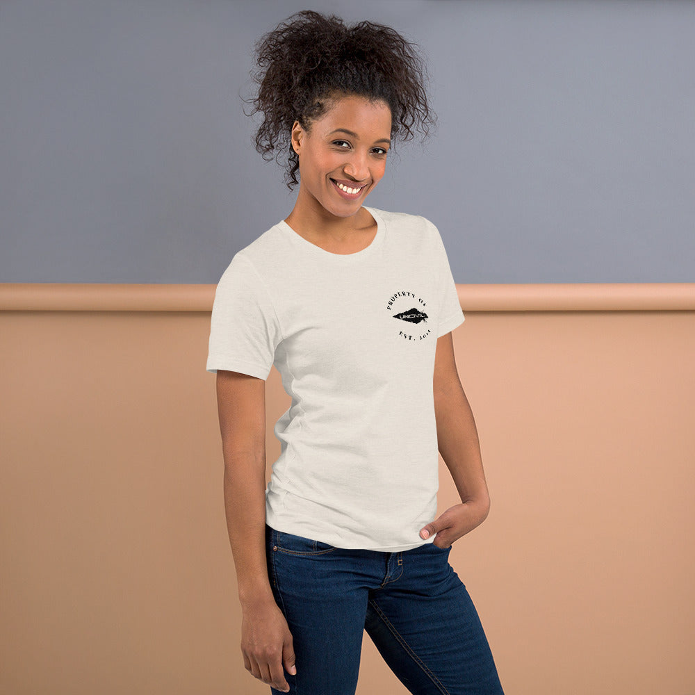 UNCIVIL Apparel Established 2015 shirt features our Uncivil Spear with the words "property of uncivil Est. 2015 on the front left chest. Heather Dust shirt.
