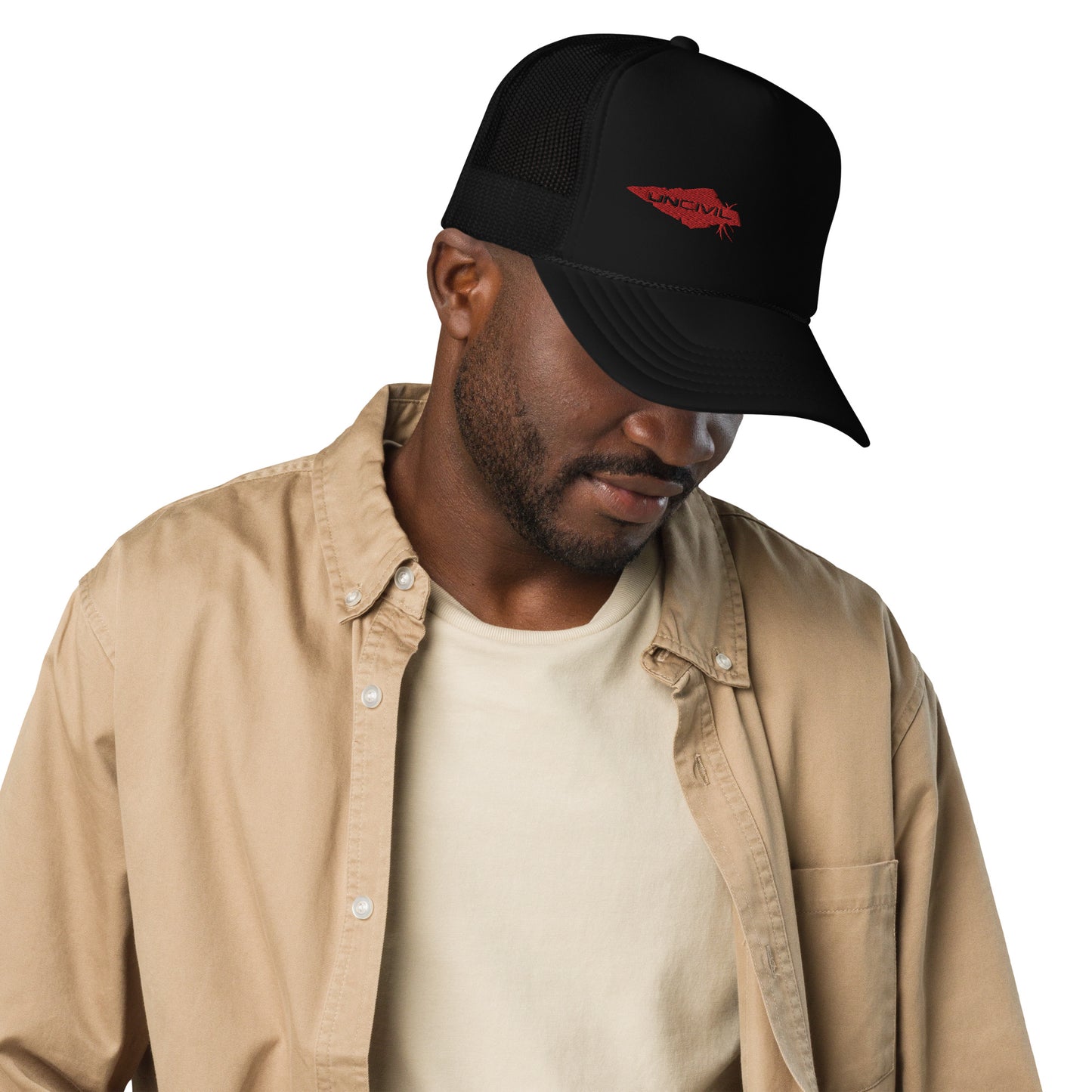 UNCIVIL Black foam trucker hat that has an adjustable snap that ensures a comfortable fit, and the mesh back provides great breathability. Featuring our UNCIVIL Logo in Red.