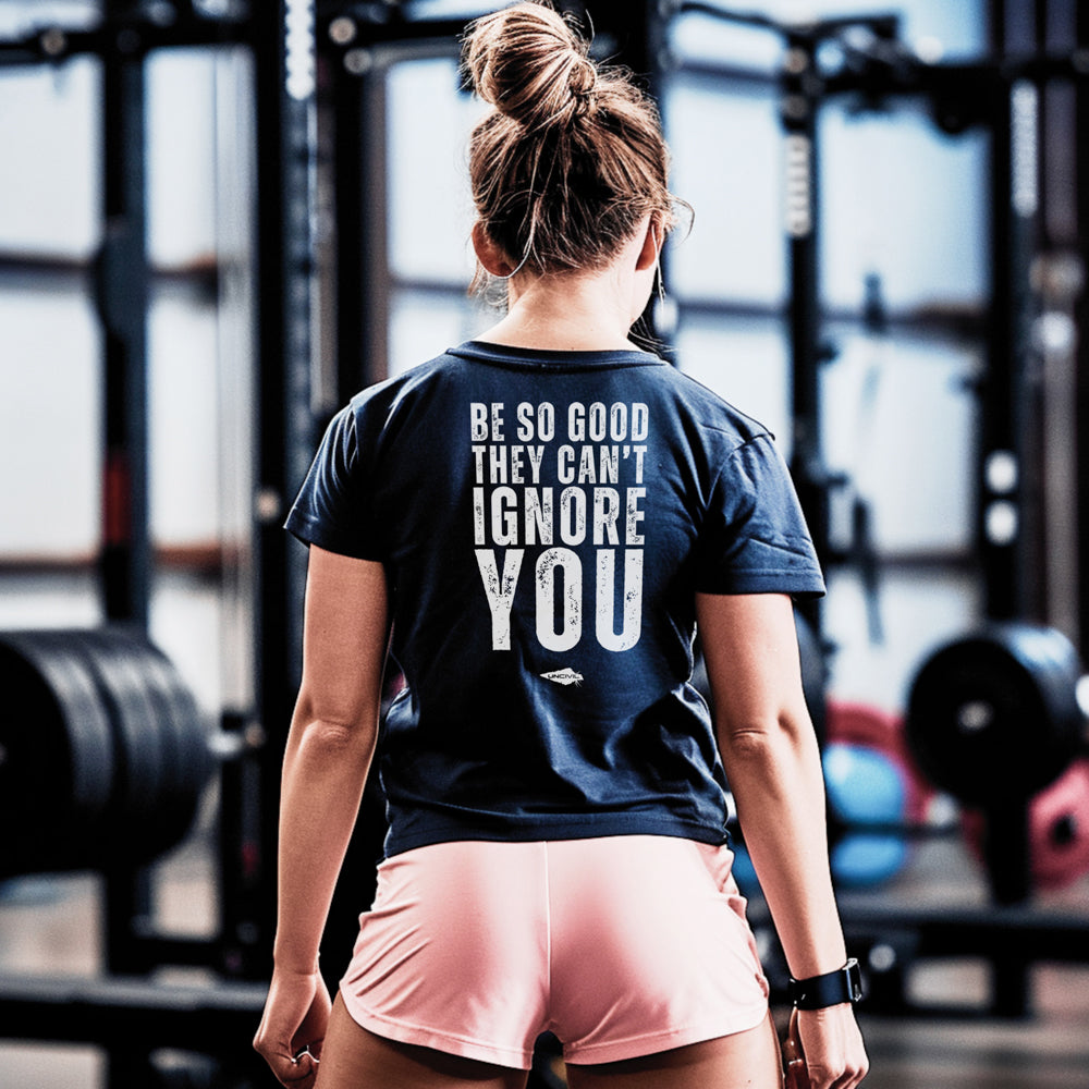 Be so good they can't ignore you dark blue tee. Women's motivational shirts.