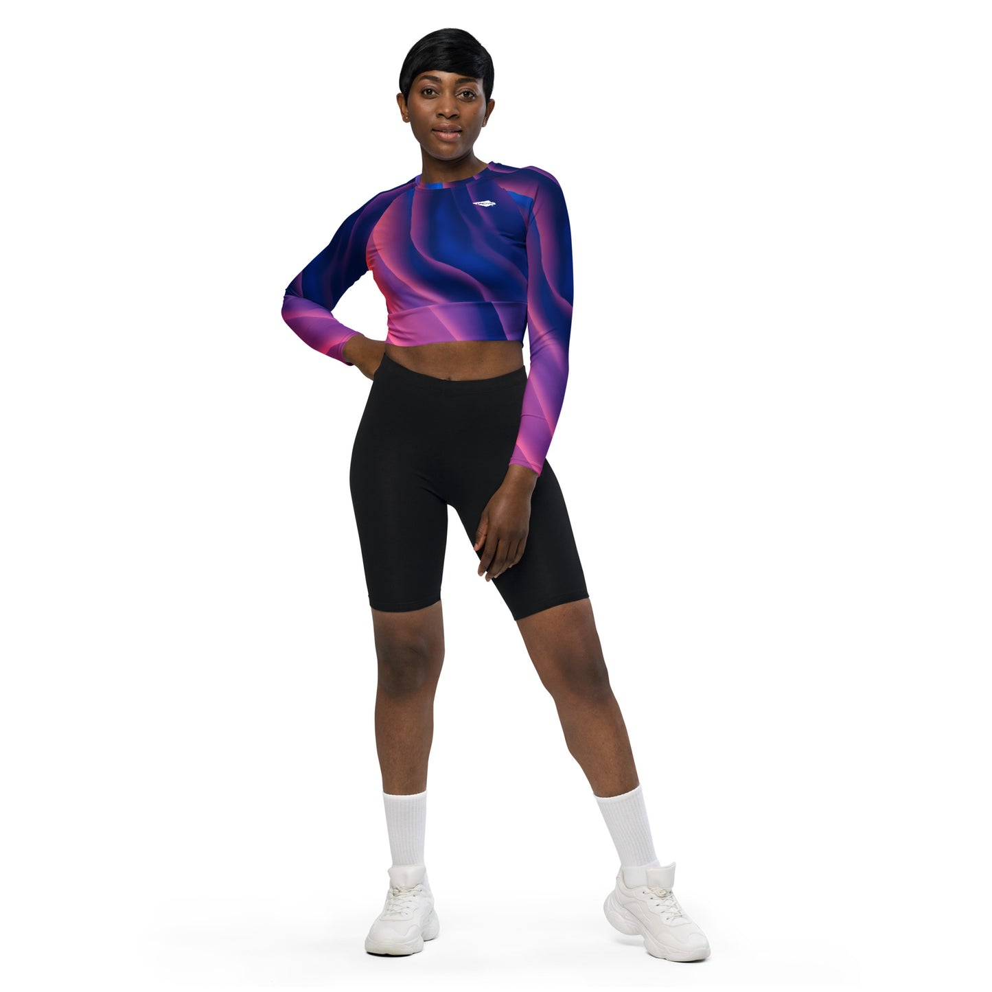 Milky Way long-sleeve crop top for women is made of recycled polyester and elastane, making it an eco-friendly choice for swimming, sports, or athleisure. UPF 50+.