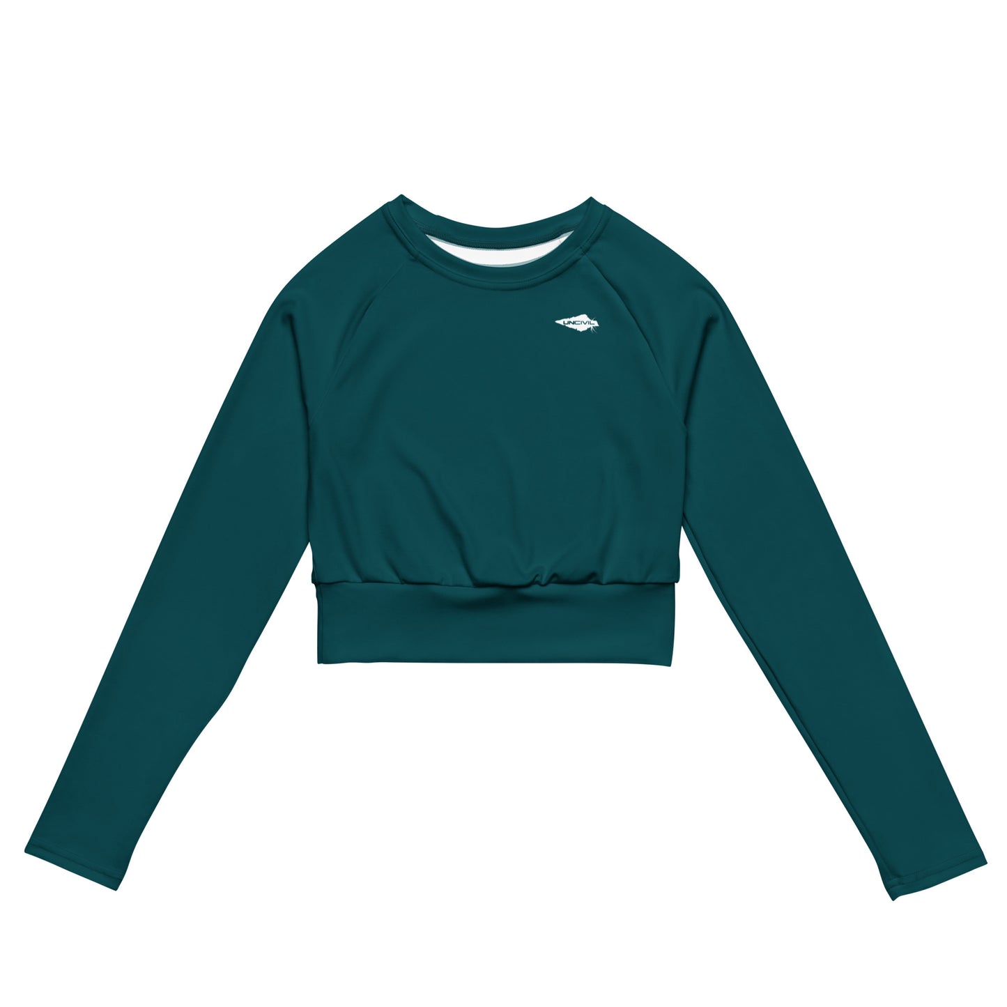Teal long-sleeve crop top for women is made of recycled polyester and elastane, making it an eco-friendly choice for swimming, sports, or athleisure. UPF 50+.