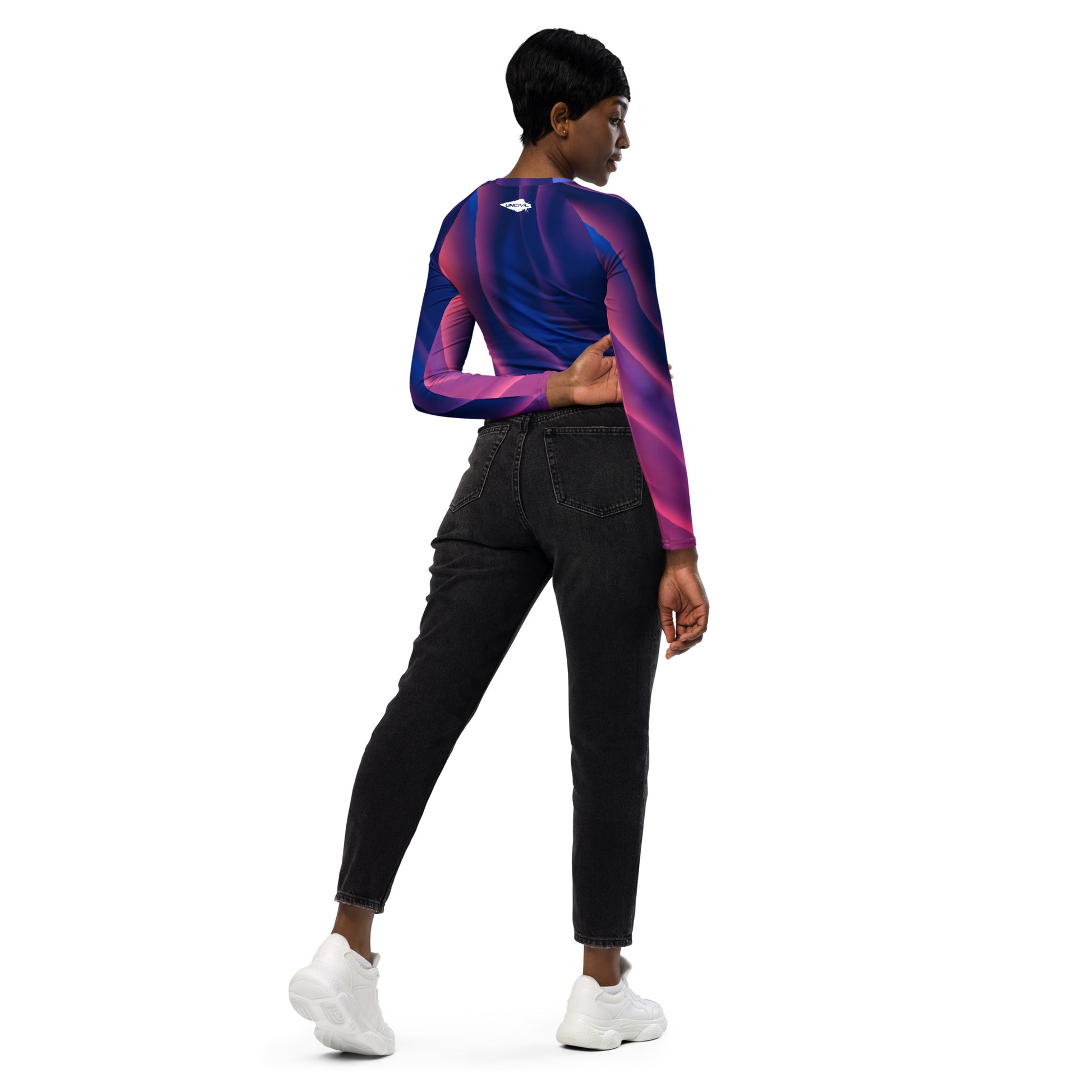 Milky Way long-sleeve crop top for women is made of recycled polyester and elastane, making it an eco-friendly choice for swimming, sports, or athleisure. UPF 50+.