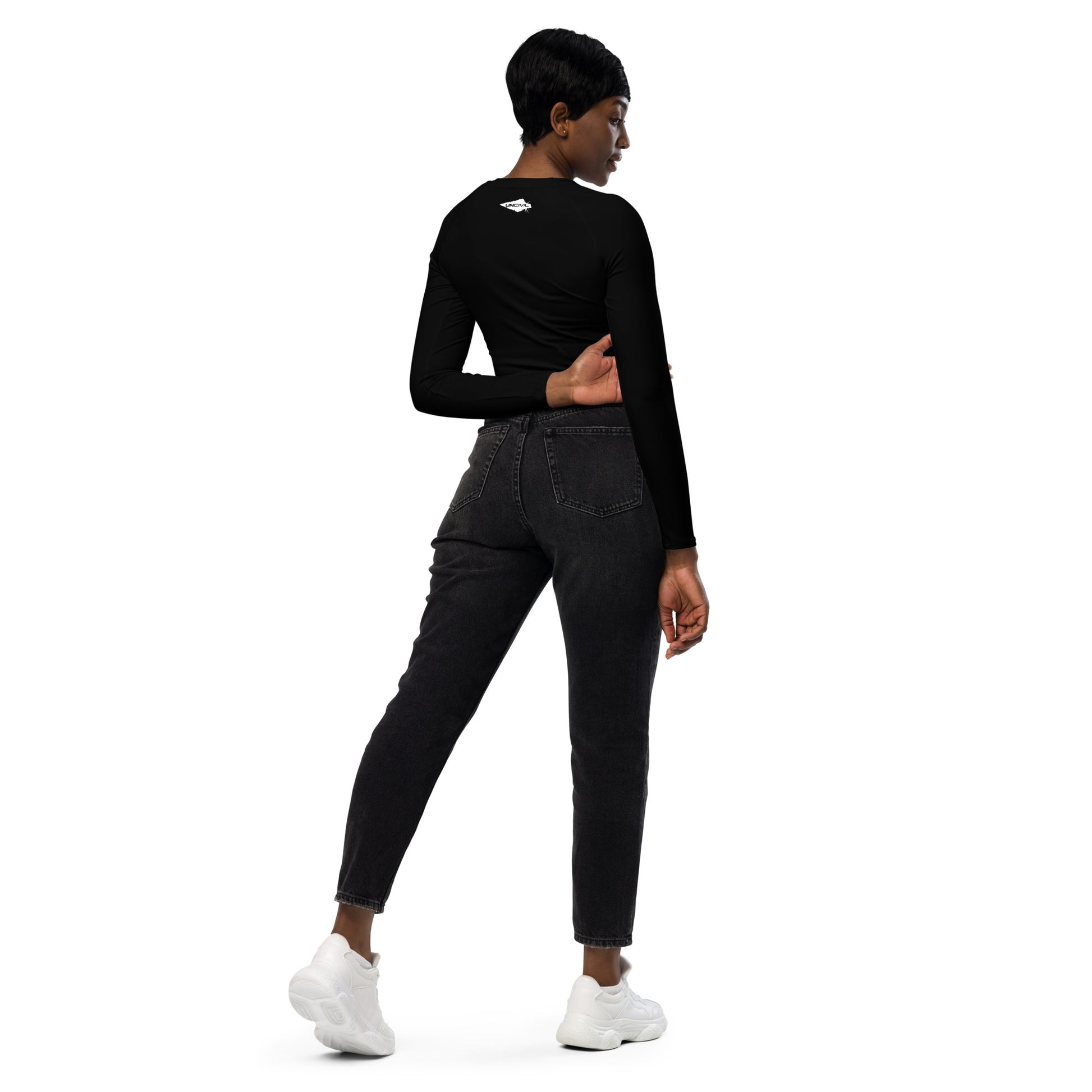 Black long-sleeve crop top for women is made of recycled polyester and elastane, making it an eco-friendly choice for swimming, sports, or athleisure. UPF 50+.