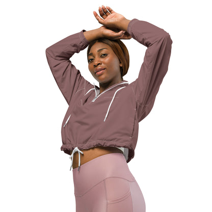 Our Muave Cropped Windbreaker is lightweight, waterproof, and suitable for every kind of adventure. Includes side-slit pockets, breathable mesh lining, and adjustable drawcords on the hood and waist.