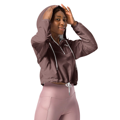 Our Muave Cropped Windbreaker is lightweight, waterproof, and suitable for every kind of adventure. Includes side-slit pockets, breathable mesh lining, and adjustable drawcords on the hood and waist.