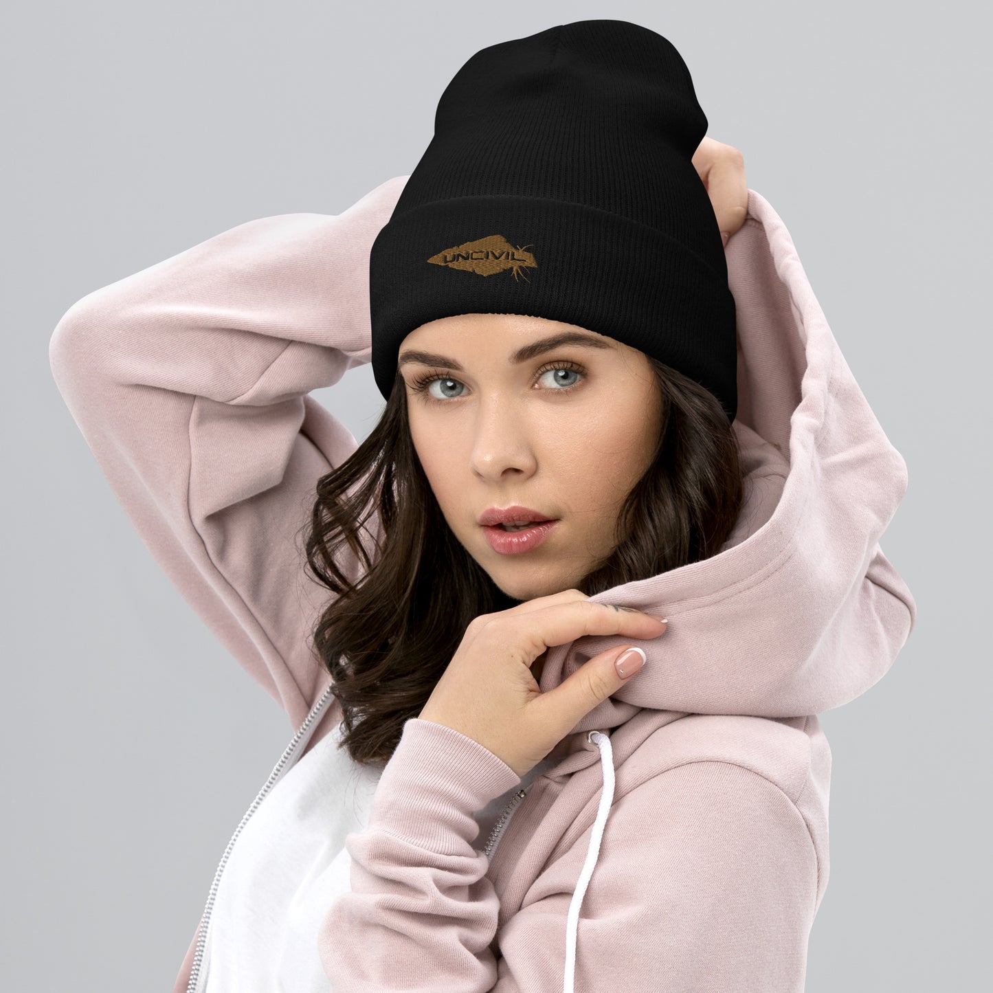Our UNCIVIL Gold cuffed beanie is a snug, form-fitting beanie for men or women. Offered in Black with our Gold UNCIVIL Spear. 