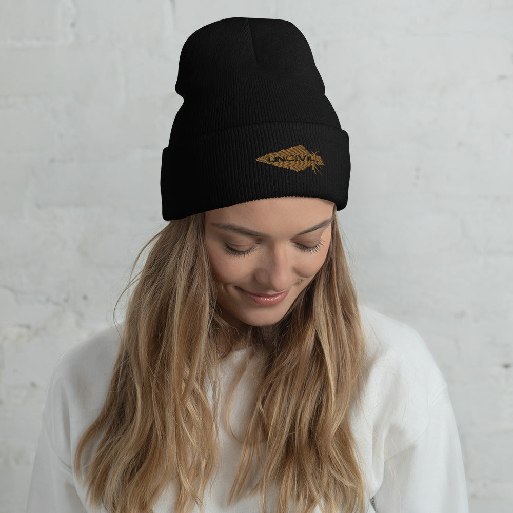 Our UNCIVIL Gold cuffed beanie is a snug, form-fitting beanie for men or women. Offered in Black with our Gold UNCIVIL Spear. 