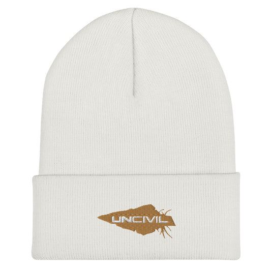 Our UNCIVIL Gold cuffed beanie is a snug, form-fitting beanie for men or women. Offered in White with our Gold UNCIVIL Spear. 