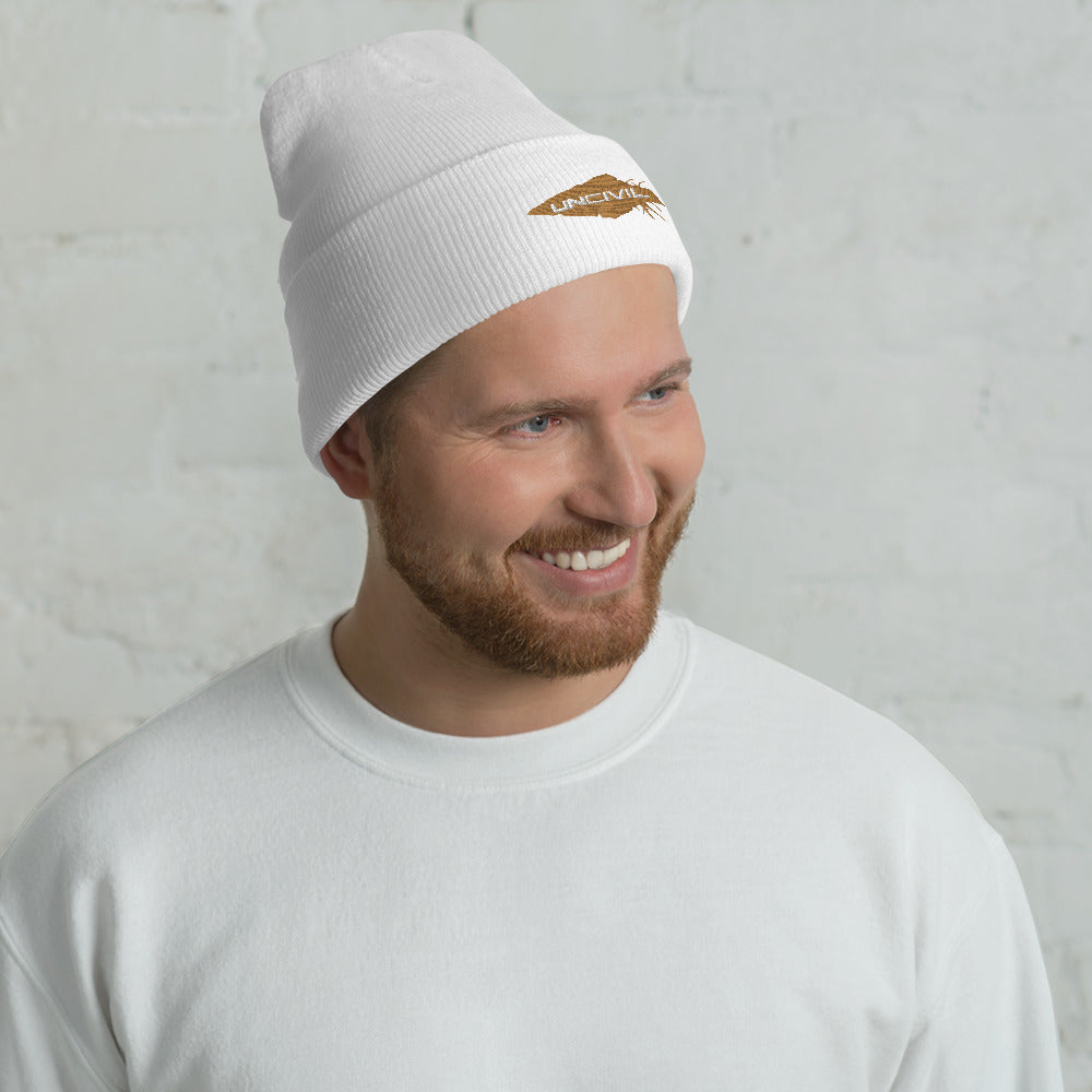 Our UNCIVIL Gold cuffed beanie is a snug, form-fitting beanie for men or women. Offered in White with our Gold UNCIVIL Spear. 