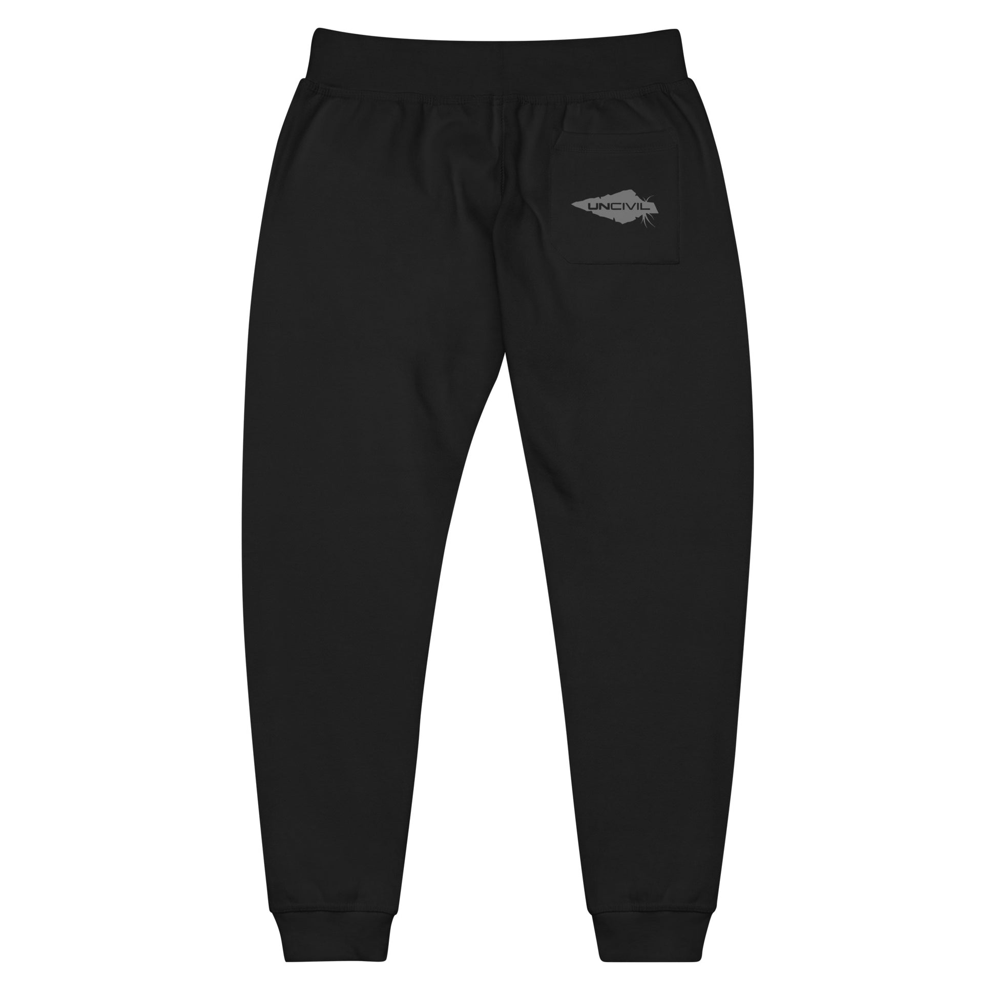 Black sweatpants, UNCIVIL on front left leg and UNCIVIL patch on the back right pocket.