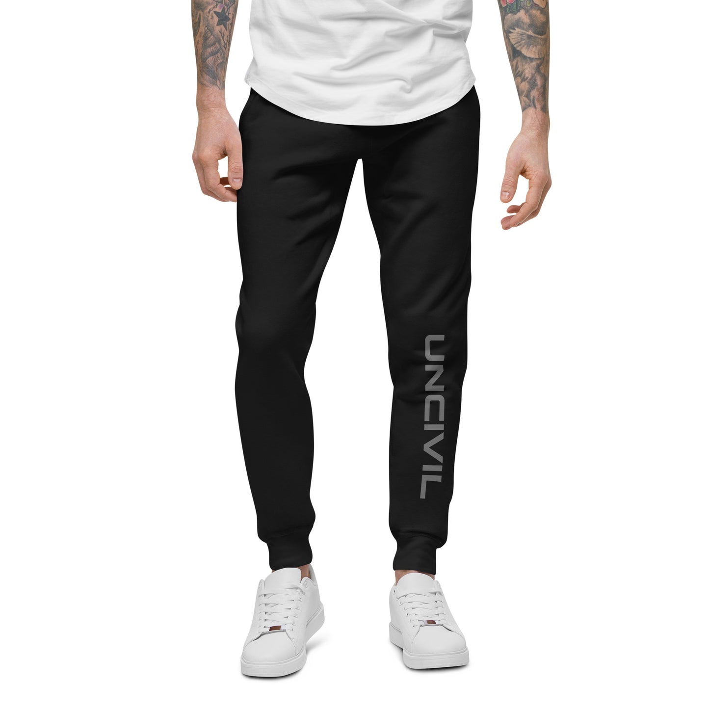 Black sweatpants, UNCIVIL on front left leg and UNCIVIL patch on the back right pocket.