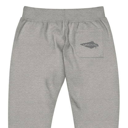 Carbon Grey sweatpants, UNCIVIL on front left leg and UNCIVIL patch on the back right pocket.