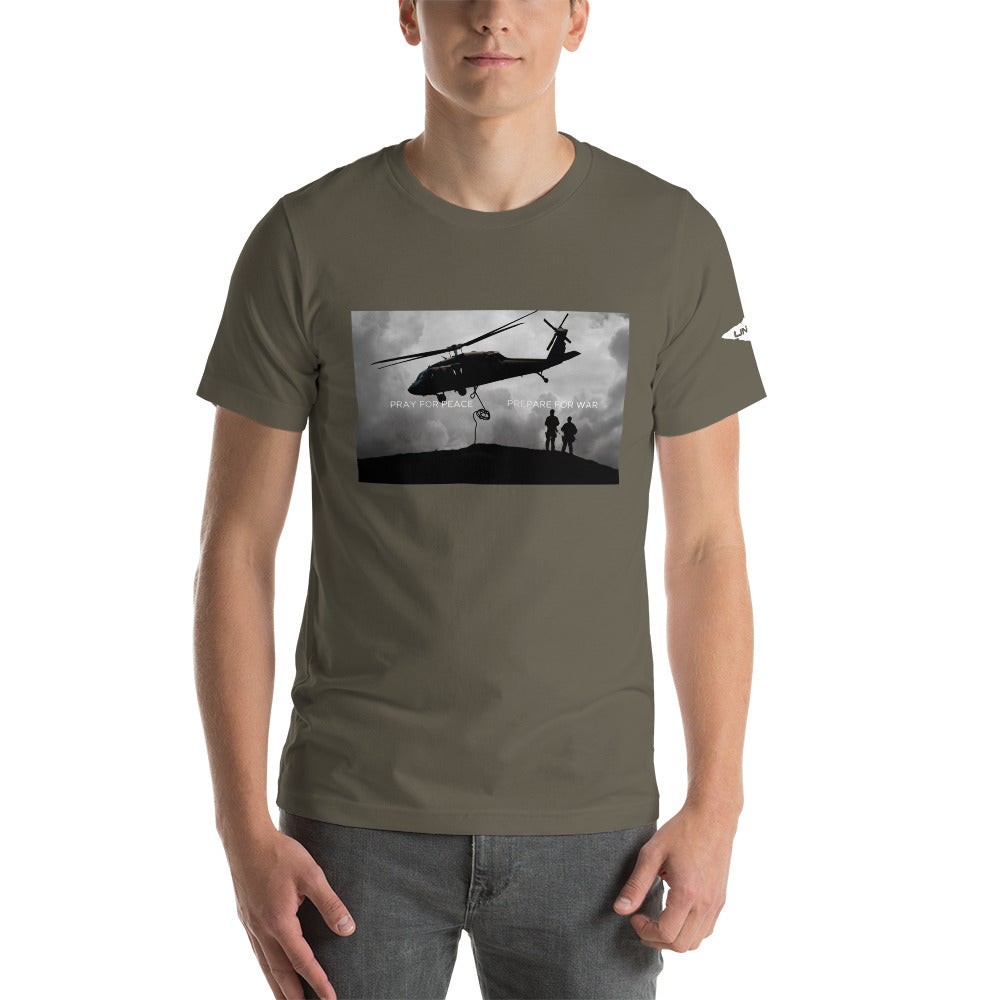 Our Prepare for War UNCIVIL shirt highlights the importance of both hoping for peaceful resolutions and being ready to defend oneself if necessary. Featuring a graphic of a Black Hawk Helicopter in black and white. Army green shirt.