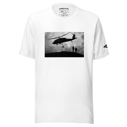 Our Prepare for War UNCIVIL shirt highlights the importance of both hoping for peaceful resolutions and being ready to defend oneself if necessary. Featuring a graphic of a Black Hawk Helicopter in black and white. White shirt.