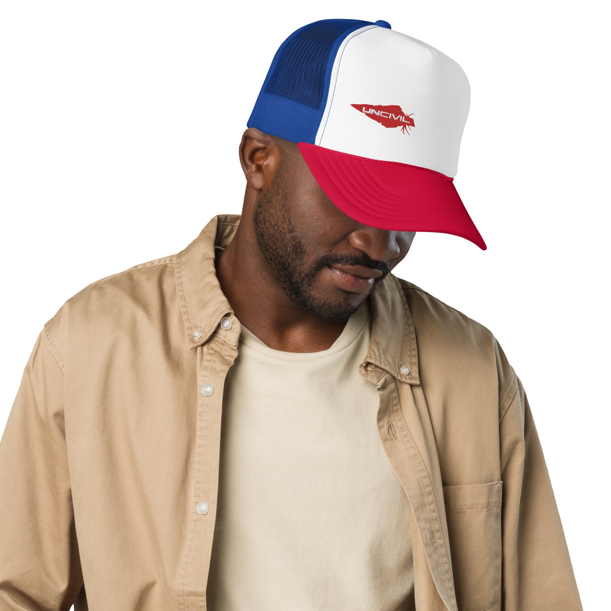 UNCIVIL Red, White, and Blue foam trucker hat that has an adjustable snap that ensures a comfortable fit, and the mesh back provides great breathability. Featuring our UNCIVIL Logo in Red.